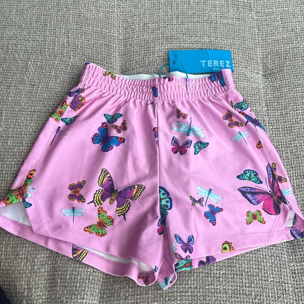 NWT. Terez KIDS GYM SHORTS IN PINK NEON BUTTERFLIES. Size 7/8